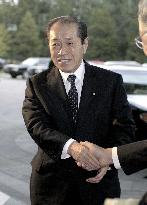 Japan ruling bloc secretaries general arrive in Beijing